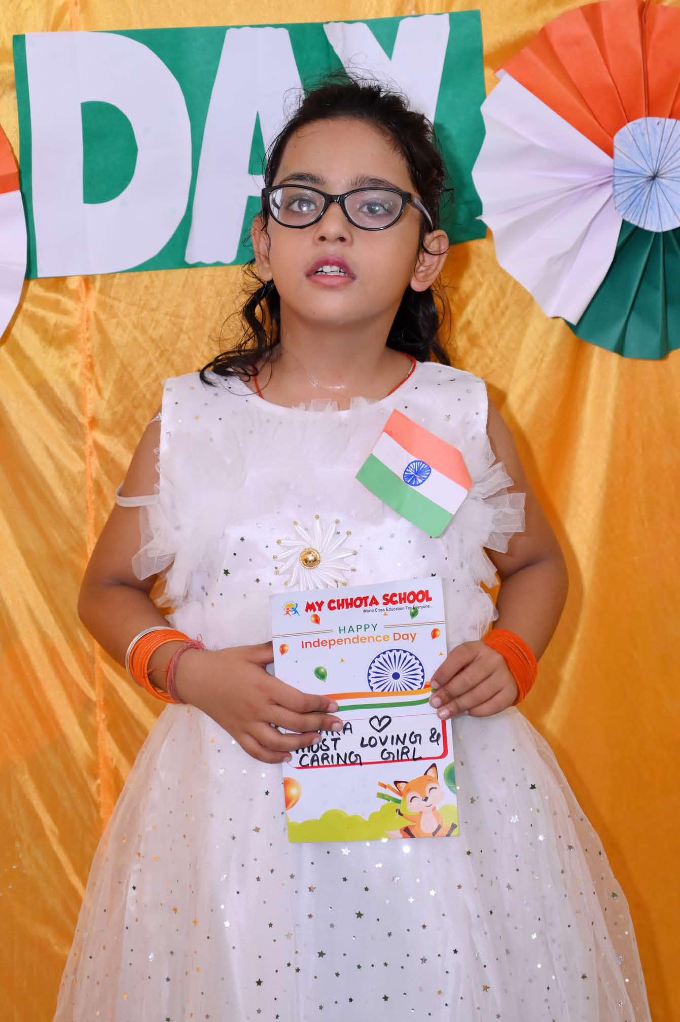 A proud student with her Independence Day certificate